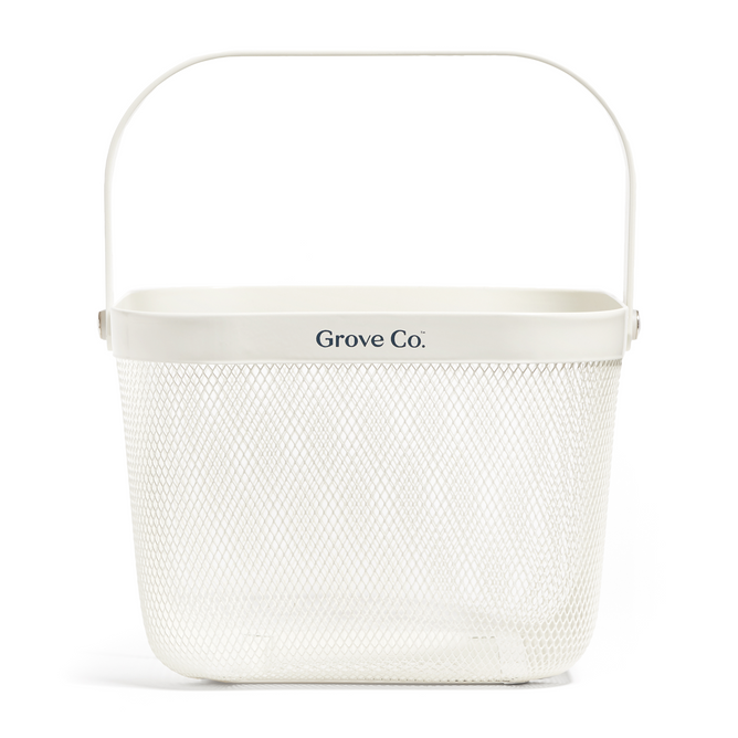 White rectangular metal caddy with mesh wire design and top handle, labeled Grove Co. Product name: Multi-Purpose Mesh Basket.