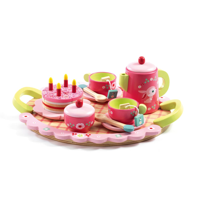 The DJECO Role Play Lili Roses Tea Party Set, crafted from 100% FSC® Certified Wood, features pink and green trays, a floral teapot, two cups, spoons, and a cake with candles. A rabbit illustration completes the set for endless fun.