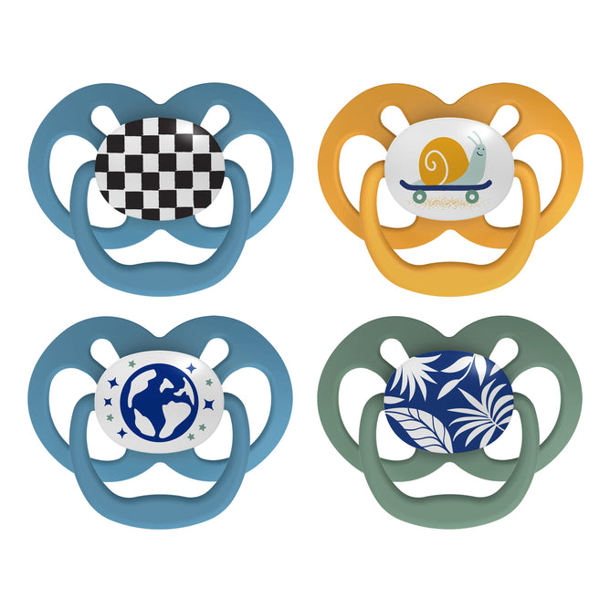 Dr. Browns Advantage Glow-in-the-Dark Pacifiers feature four colorful designs: a black-and-white checkered pattern, a snail on wheels, a globe with stars, and a blue and white leaf pattern. Each Stage 2 fully symmetrical soother includes an open shield design and soft silicone bulb.
