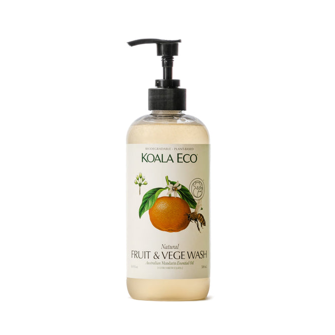 Koala Ecos Natural Fruit & Vege Wash bottle has a pump dispenser and a label featuring an orange, white flowers, and a bee. Its plant-based, biodegradable, removes pesticides effectively, and is infused with essential oils for freshness.