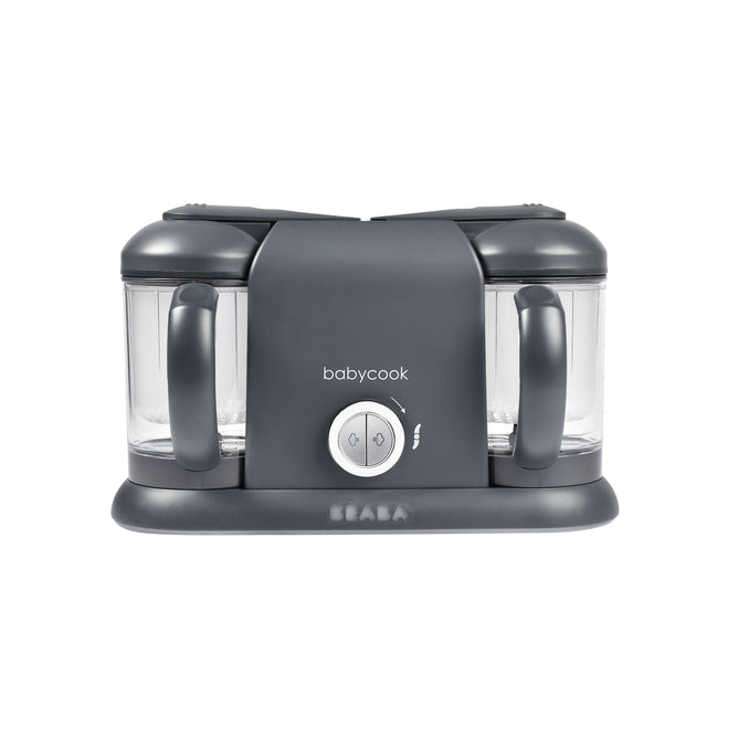 Front view of the BEABA Babycook Duo Baby Food Maker in gray, featuring dual containers with handles. Ideal for homemade baby food, it allows convenient one-handed operation via a central control knob, with branding below.