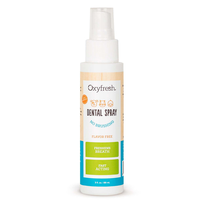 A 3 fl. oz. Oxyfresh Pet Bad Breath Fast Acting Dental Spray, veterinarian approved for pet dental care, with a spray nozzle. The label reads No Brushing, Flavor Free, highlighting features like Freshens Breath and added plaque removal benefits.