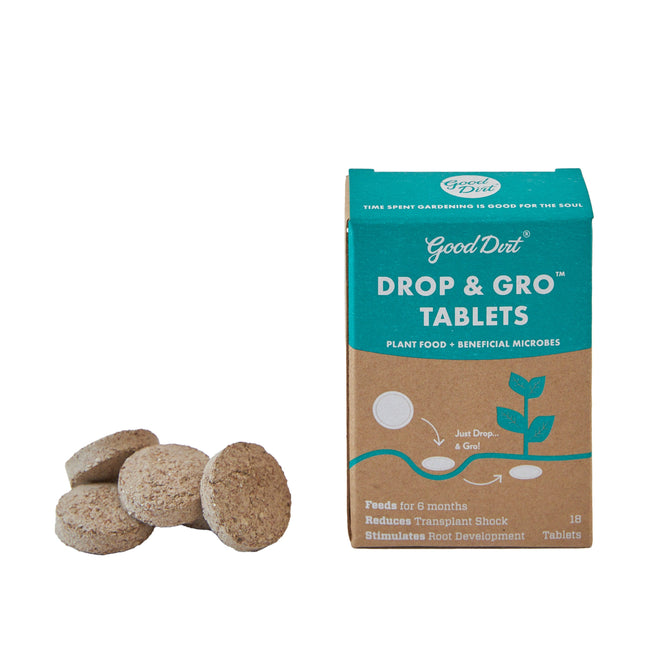 A Good Dirt Drop & Gro Tablets box displays plant growth graphics, with four round tablets beside it, highlighting their function as a biostimulant to boost soil health and aid plant establishment.