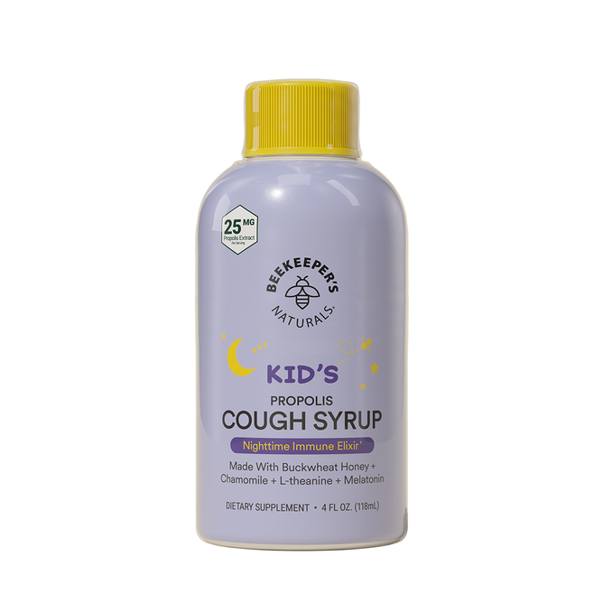 A 4 fl oz bottle of Beekeepers Naturals Kids Propolis Cough Syrup Nighttime features a yellow cap and a purple label with a crescent moon and stars, showcasing its soothing blend of buckwheat honey, chamomile, L-theanine, and melatonin.