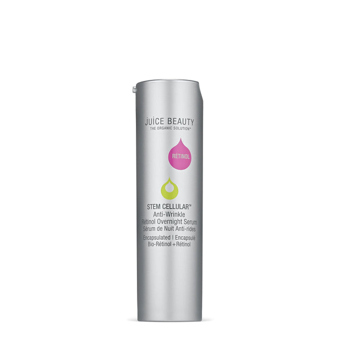 A silver cylindrical bottle of Juice Beautys Stem Cellular Anti-Wrinkle Retinol Overnight Serum features a pink and green label, emphasizing its encapsulated retinol formula and outstanding anti-aging benefits for rejuvenated skin.