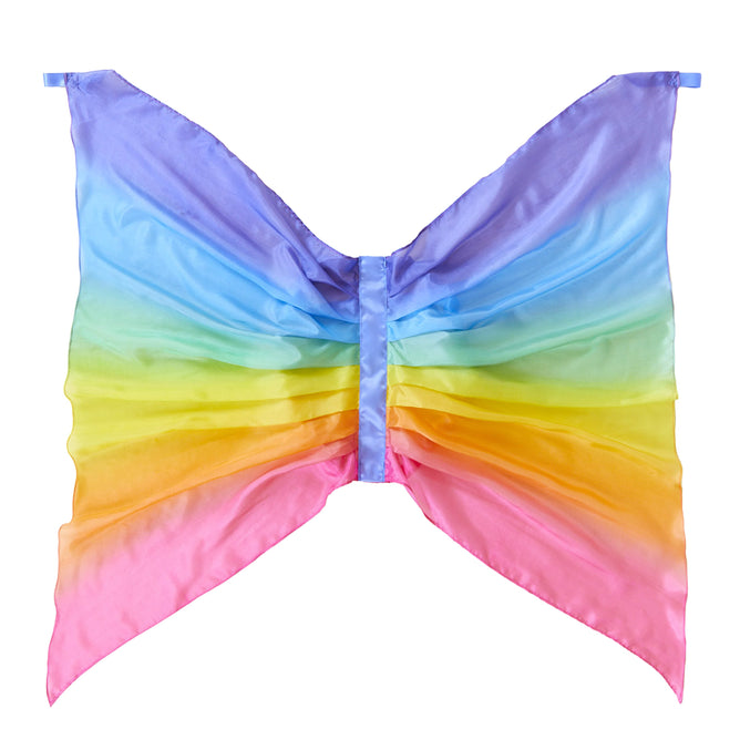 Sarahs Silks Rainbow Fairy Wings offer a vibrant gradient pattern ideal for dress-up, transitioning smoothly from purple to pink through blue, green, yellow, and orange. Attached to a central fabric strip, these enchanting wings are perfect for imaginative play.