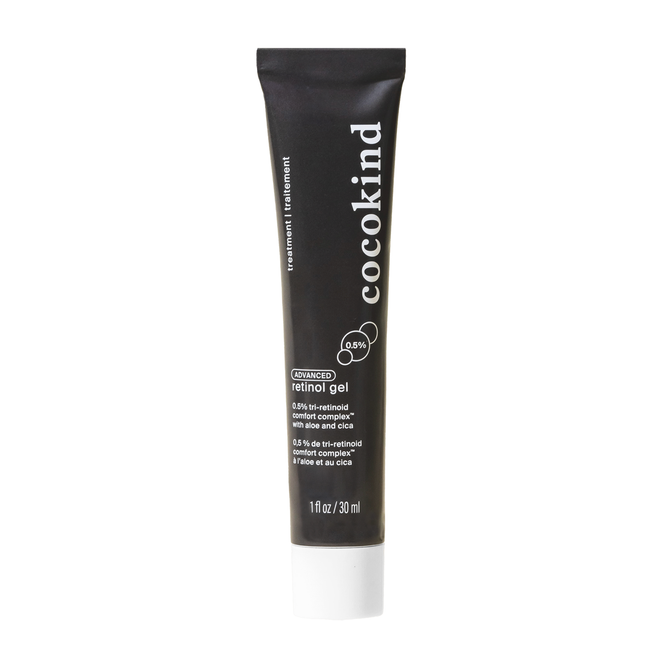 A black tube of Cocokinds Advanced Retinol Gel showcases white text highlighting its 0.5% active retinoid, ceramides for sensitive skin, and the Tri-Retinoid Comfort Complex. The 1 fl oz (30 ml) size stands out against a clean white background.