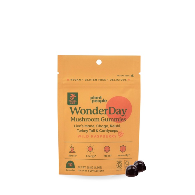 A vibrant orange pack of Plant Peoples WonderDay - Super Mushroom Gummies is showcased, highlighting stress relief and immune support benefits. Two dark gummies appear in front, emphasizing their mood enhancement and natural stress response benefits.
