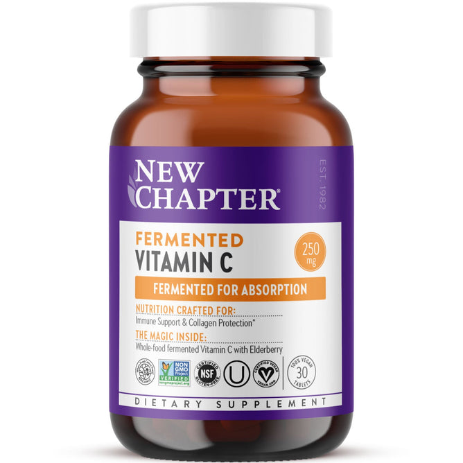 A brown bottle of New Chapters Fermented Vitamin C Supplement showcases a purple and white design. Inside are 250 mg capsules that enhance absorption, offer antioxidant support, and boost the immune system. The labels highlight non-GMO, organic, and dietary supplement features.