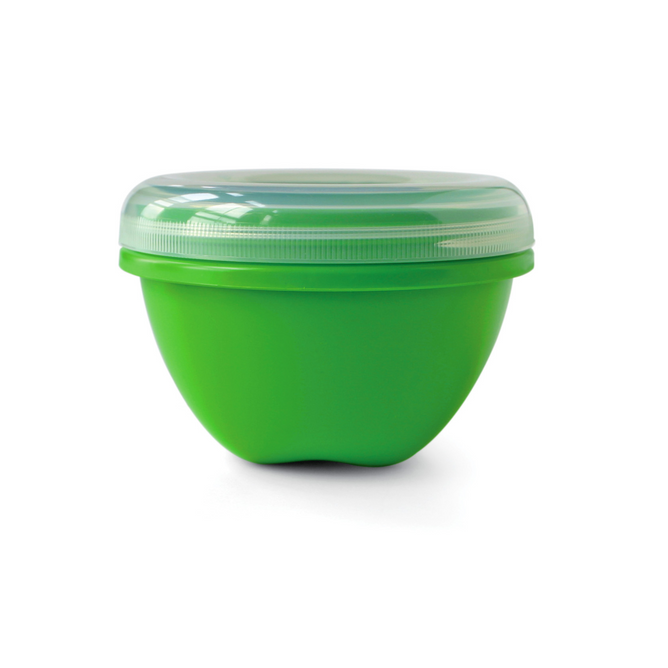The Preserve Food Storage Round Large bowl, made from recycled plastic, is bright green with a translucent, BPA-free lid designed for airtight storage. Its smooth, rounded shape ensures convenient use and eco-friendly versatility.