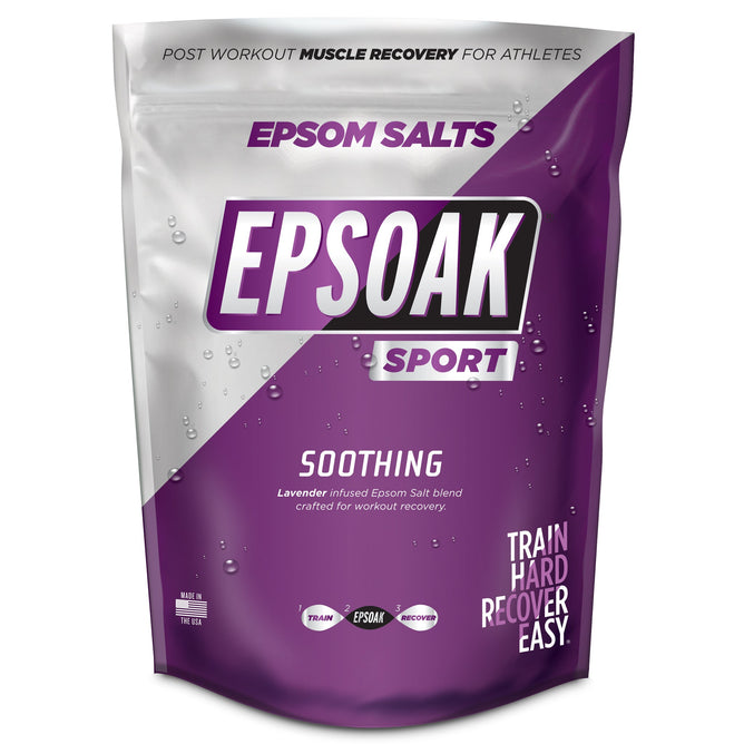 The purple and white bag of San Francisco Salt Cos Sport Soothing Epsom Salts offers a lavender-infused blend for athlete recovery. Featuring the slogan Train Hard, Recover Easy, it highlights muscle rejuvenation and is proudly made in the USA.