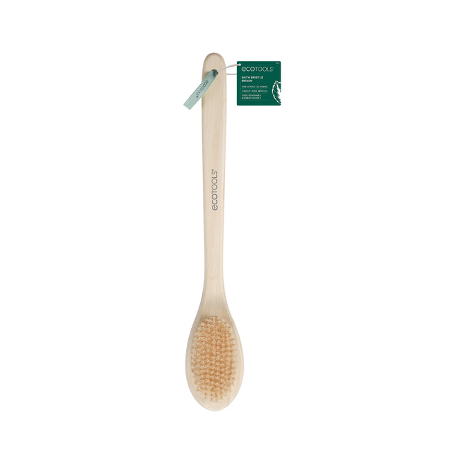 The EcoTools Bamboo Bristle Bath Brush, featuring sustainable bamboo and natural bristles, is ideal for exfoliating and body cleansing. It displays the EcoTools logo and comes with an eco-friendly tag, offering a refreshing scrub experience.