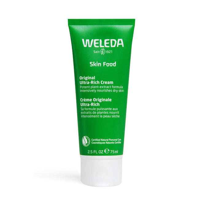 A 2.5 fl oz (75 ml) Weleda Skin Food Original Ultra-Rich Cream tube, rich in plant extracts, nourishes dry skin. Its green packaging features text in English and French and showcases the certified natural personal care logo.