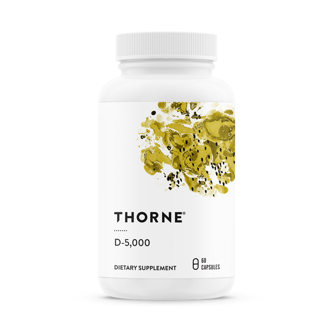 A white bottle labeled Thorne Vitamin D-5000 contains 60 capsules of a Vitamin D3 supplement to support immune function, featuring an abstract design with gold and green splashes.