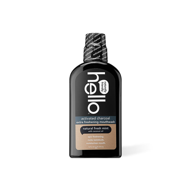 The hello Activated Charcoal Extra Freshening Mouthwash comes in a black bottle with a black cap and protective seal. Infused with activated charcoal, coconut oil, and fresh mint, it is perfect for your oral care routine.