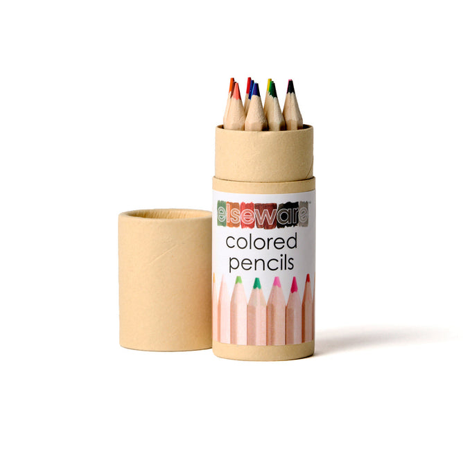 An open cylindrical elseware container reveals several pre-sharpened colored pencils. The label, featuring vibrant pencil tip images on a white background, promotes its eco-friendly, plastic-free packaging.