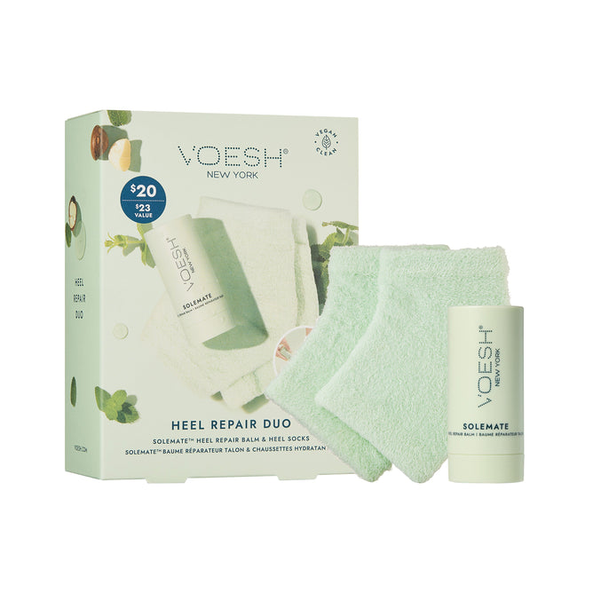 The VOESH New York Heel Repair Duo includes a Heel Repair Balm and mint green Moisturizing Heel Socks to address cracked heels. The packaging, adorned with green leaves and product images, has a price of $20 but is valued at $23.