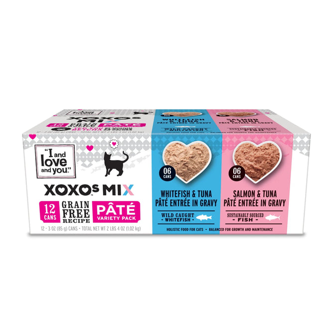 The XOXOs Mix Cat Food - Pâté Variety Pack by I and Love and You includes 12 wet cat food cans: six Whitefish & Tuna entrée in gravy and six Salmon & Tuna. Heart-shaped images showcase the texture, making it a must-have for your felines gourmet cravings.