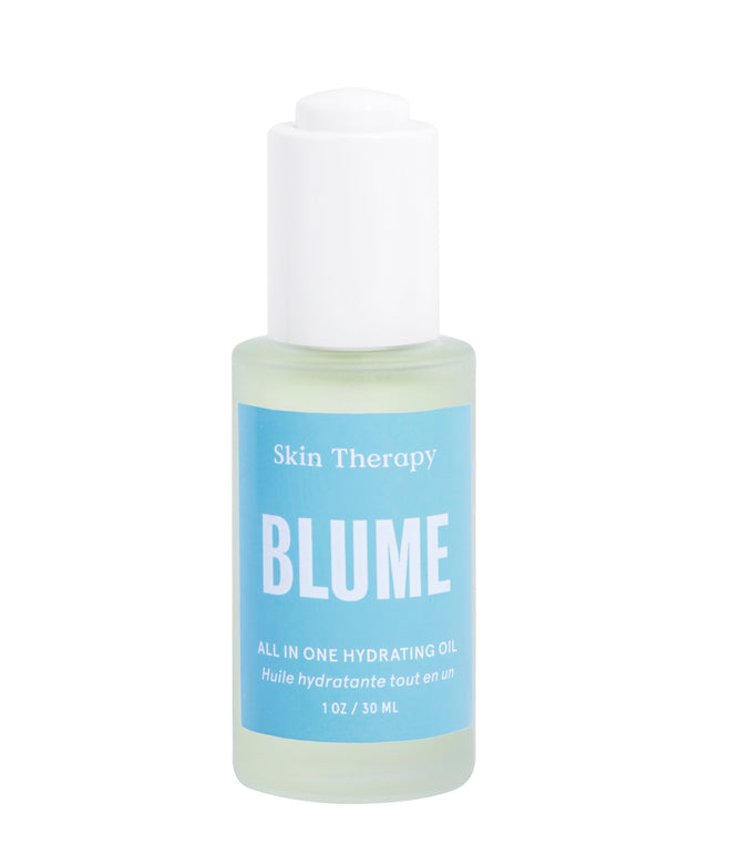 A compact, transparent Blume Skincare bottle with a white cap contains Skin Therapy All-in-One Nourishing Face Oil. The blue label highlights All-In-One Hydrating Oil and 1 oz / 30 ml. Antioxidant-infused, it promises hydration and radiant skin.