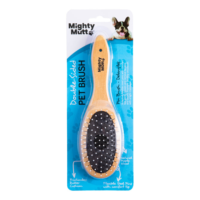 The Bamboo Grooming Brush for Pets by Mighty Mutt is double-sided with a wooden design and nylon bristles. Packaged in blue, it highlights its ergonomic handle and flexible stainless steel pins, featuring a small dog image at the top right corner.