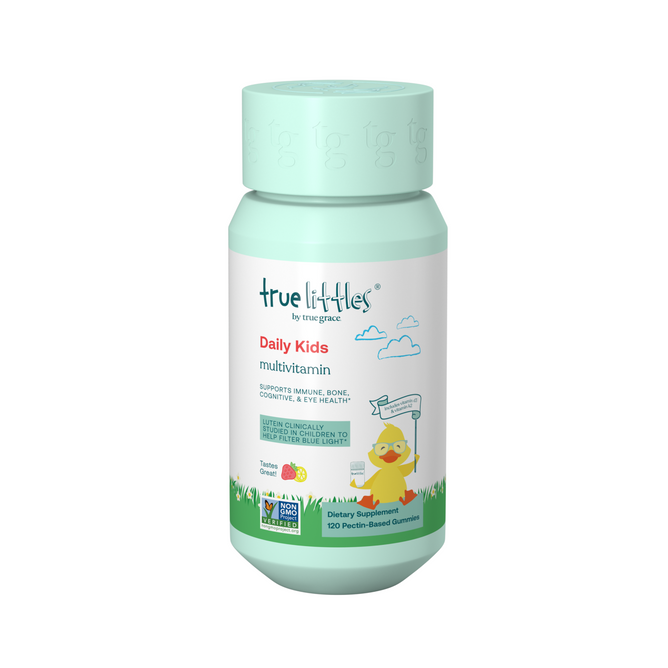 A bottle of True Graces True Littles Daily Kids Multivitamin gummies offers strawberry lemonade flavor with 120 pectin-based lutein-enriched gummies. The label, with a cartoon duck holding a sign, supports immune, bone, growth, and eye health.