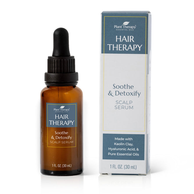 Plant Therapys Hair Therapy Soothe & Detoxify Scalp Serum comes in a 1 fl oz (30 ml) brown glass dropper bottle and box. It promotes hair growth with kaolin clay, hyaluronic acid, and pure essential oils.