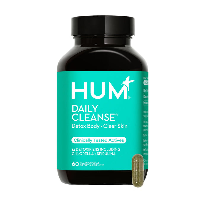 HUM Nutritions Daily Cleanse Detox Supplement bottle, in black with a teal label, promises a natural detox for clear skin. It contains 60 vegan capsules featuring potent detoxifiers like chlorella and spirulina, with one capsule prominently displayed.