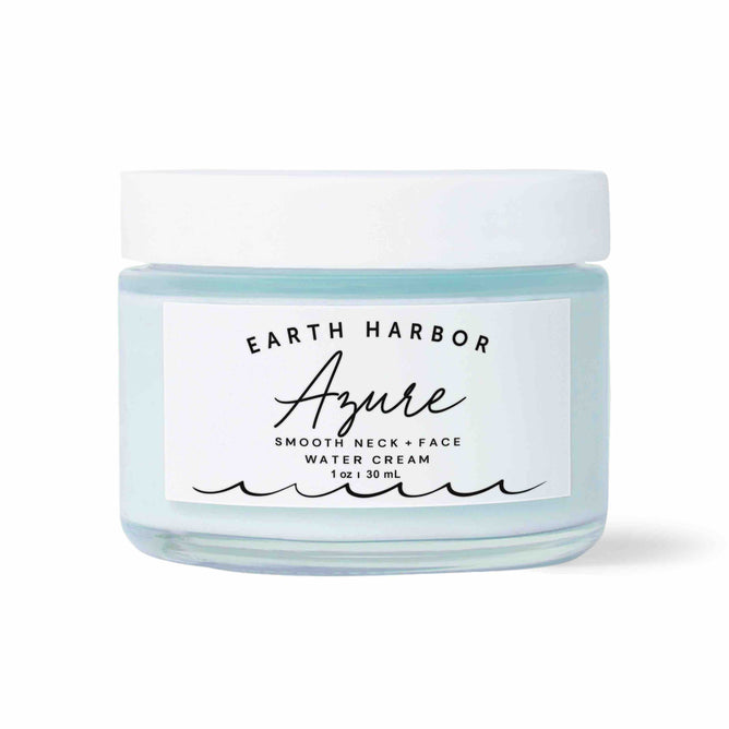 The 1 oz Earth Harbor AZURE Smooth Neck + Face Water Cream comes in a white jar with light blue contents, wave graphics, and emphasizes its Seaweed Amino Acids. This regenerative formula revitalizes your neck and face.