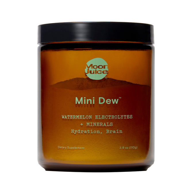 The brown jar of Moon Juices Mini Dew is a 3.9 oz (110g) dietary supplement filled with watermelon electrolytes and minerals, designed to boost hydration and support brain health.