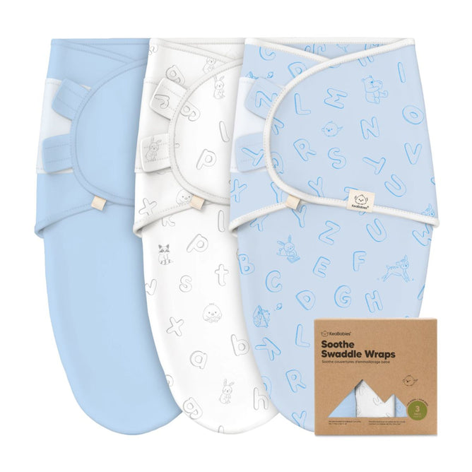 The KeaBabies GOTS Certified Soothe Swaddle Wraps, made of 100% organic cotton, feature a set of three wraps: solid light blue, white with animal outlines, and light blue with alphabet letters. They come in a brown box promoting comfort and sustainability.