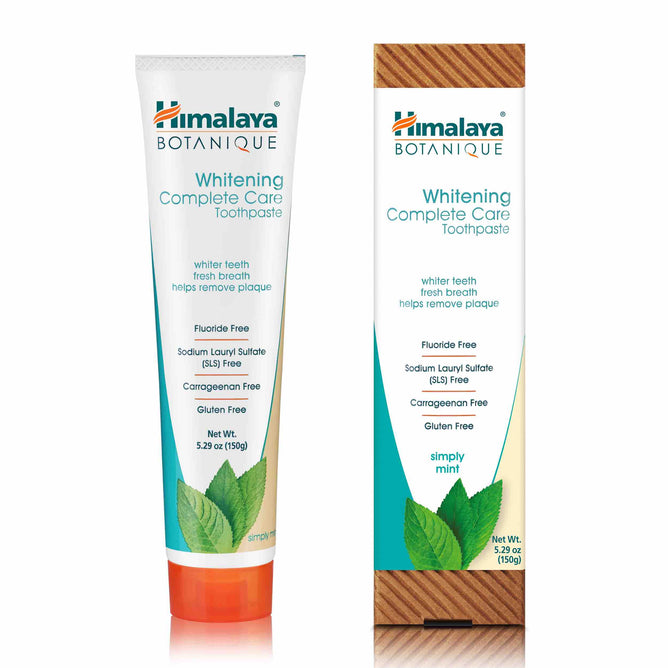 Himalayas Whitening Complete Care Toothpaste, in a 5.29 oz tube and box, highlights its Ayurvedic heritage. This vegan toothpaste is fluoride-free, SLS-free, carrageenan-free, and gluten-free with mint leaves for fresh breath and teeth whitening.