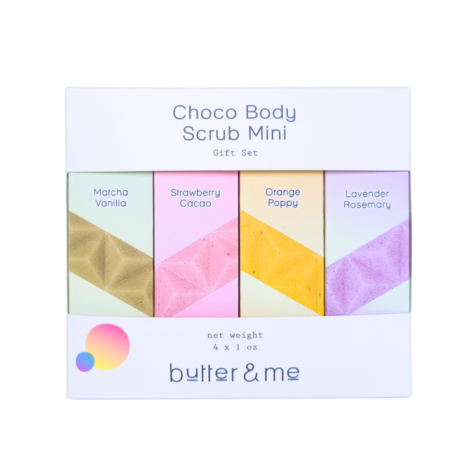 Discover butter & mes Choco Body Scrub Mini Gift Set, featuring four indulgent bars: Matcha Vanilla, Strawberry Cacao, Orange Poppy, and Lavender Rosemary. Enriched with cocoa butter and sugar exfoliants, each mini is wrapped in white packaging adorned with a vibrant circle logo.