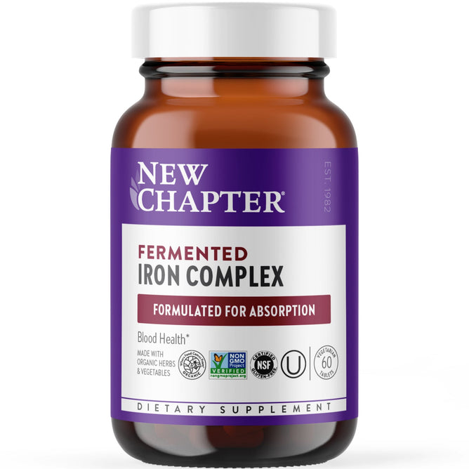 A brown bottle of New Chapters Fermented Iron Complex, promoting blood health, features a purple and white label with multiple certifications. It contains 60 energy-boosting capsules designed for absorption and enhanced vitality, while being gentle on the stomach.
