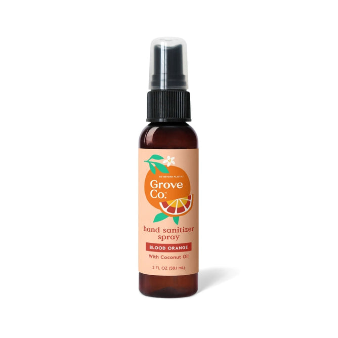 Grove Co. Hand Sanitizer Spray, Blood Orange scent, 2 fl oz, features an orange label with citrus graphics. Kills 99.9% of germs, non-drying with coconut oil, and includes a convenient pump top.