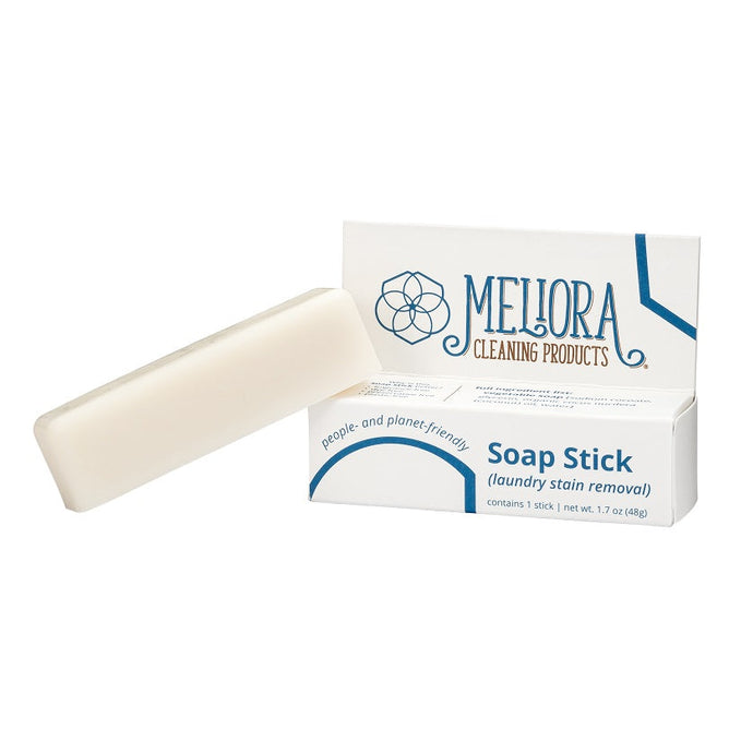 A Meliora Stain Remover Stick is partially visible in its open, plastic-free box labeled for laundry stain removal. Ideal for tough stains, it weighs 1.7 oz (48g) and is people- and planet-friendly.