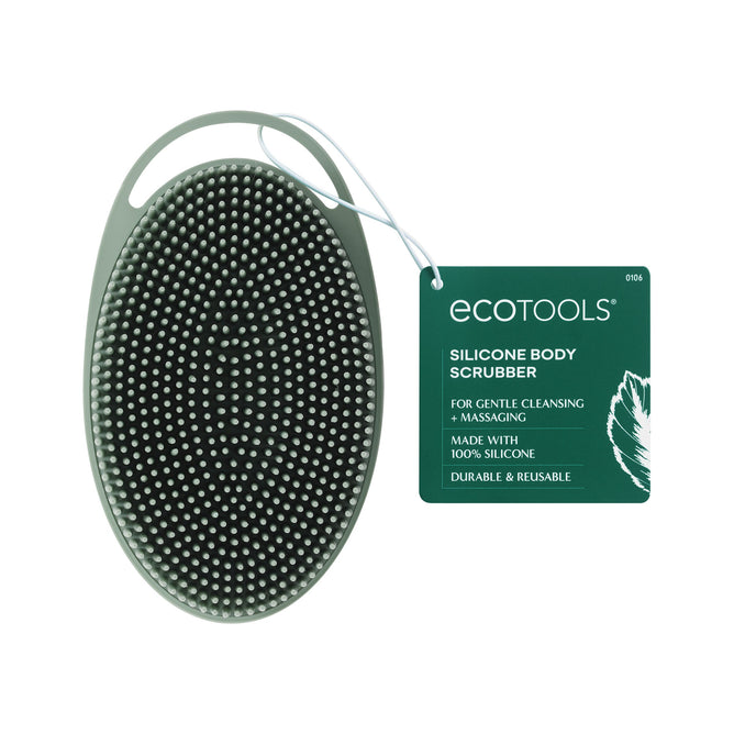 The EcoTools Silicone Scrubber is an eco-friendly, green oval silicone body scrubber with a handle featuring numerous small bristles for gentle cleansing and massaging. Its 100% silicone, reusable, durable, and cruelty-free.