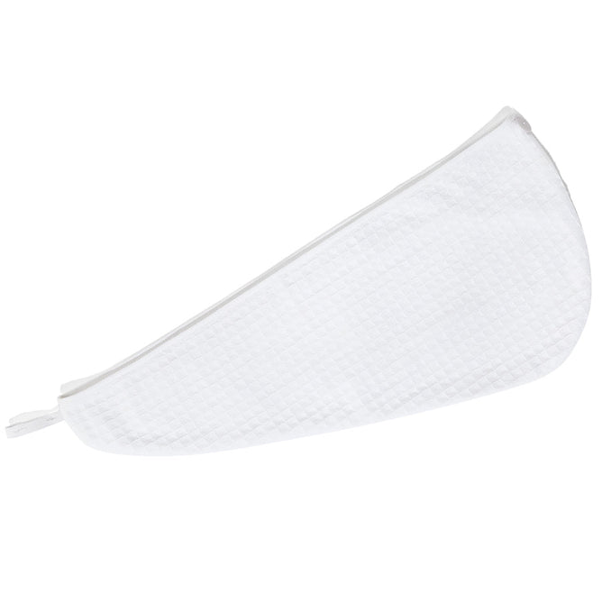 A white zippered pouch made of organic cotton from Grove Co., featuring a textured grid pattern, is laid flat and viewed from above. It has a curved side and a straight edge, resembling a chic accessory for your Organic Cotton Hair Towel.