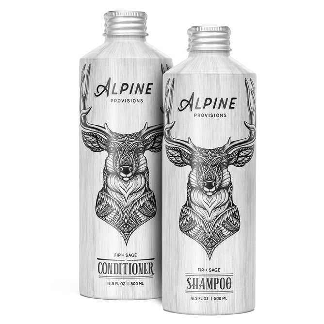Alpine Provisions offers a Shampoo and Conditioner Set - Fir & Sage with two 16.9 fl oz aluminum bottles featuring stag illustrations, embodying natural hair care and effective cleansing.