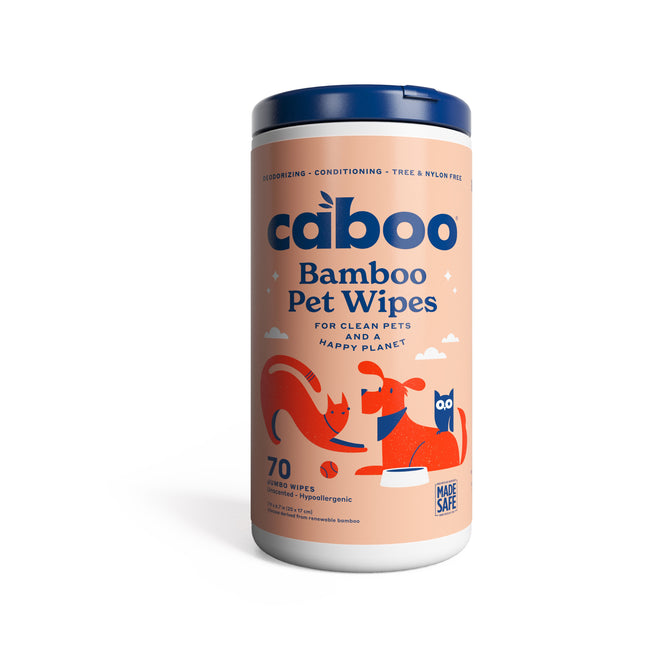 A cylindrical container of Caboo Pet Wipes features an orange dog and cat, highlighting its deodorizing and conditioning formula. It contains 70 tree- and nylon-free hypoallergenic wipes, perfect for pets.