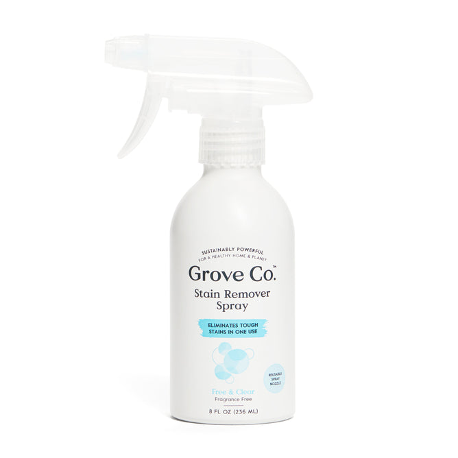 Grove Co. Stain Remover Spray in an 8 fl oz (236 ml) white bottle, labeled Free & Clear and Fragrance Free, uses natural cleaning enzymes to eliminate tough stains in one use. Its a cruelty-free solution.