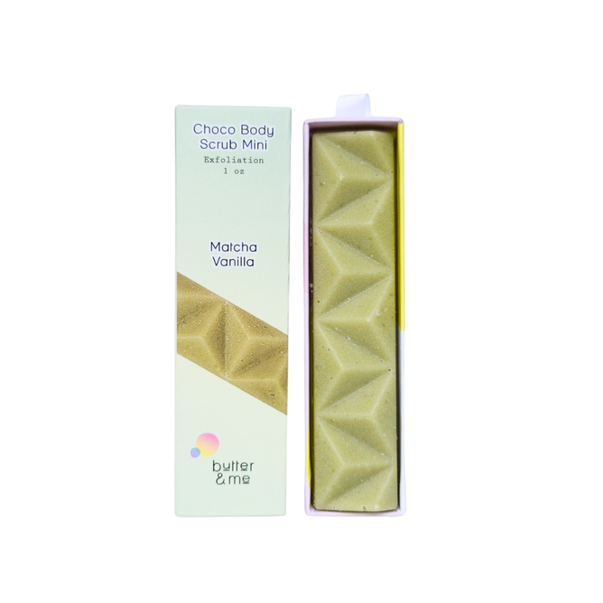 The Choco Body Scrub Mini from butter & me, in Matcha Vanilla, reveals a textured, light green scrub. With minimalist pastel hues, it combines the benefits of a sugar exfoliant and rich cocoa butter for smooth skin.