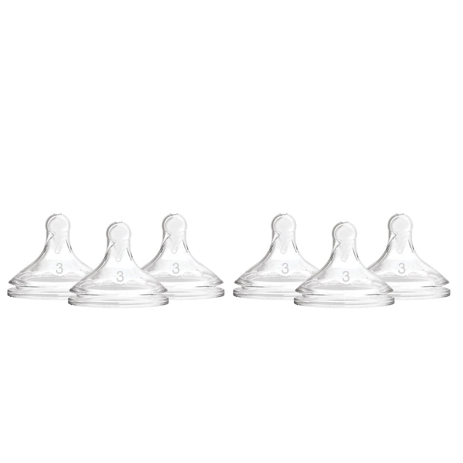 Six Dr. Browns Level 3 Flow Silicone Wide-Neck Nipples, arranged in two rows, stand out clearly against the plain white background, showcasing their anti-colic features and transparent design.
