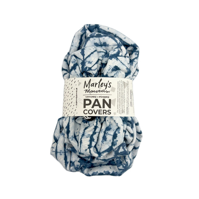 A bundle of washable, reusable pan covers featuring a blue and white tie-dye pattern, crafted from food-safe waterproof PUL for flexible sizing and a tighter fit, is sold as the Marleys Monsters Pan Cover Bundle.
