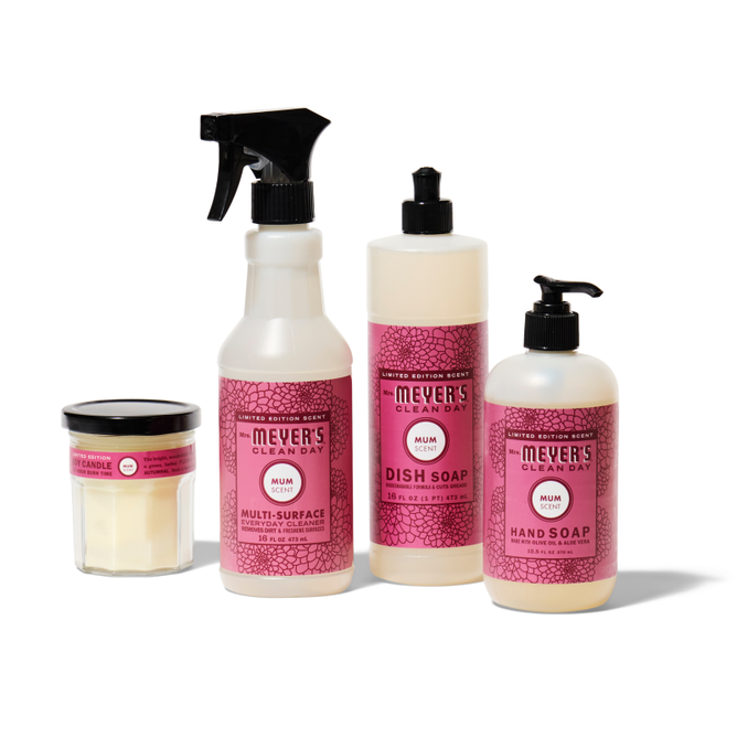 The Mrs. Meyers fall-freshen-up-set-mmcd includes a candle, multi-surface spray, dish soap, and hand soap in pink Mum scent, all with matching labels and displayed on a white background.