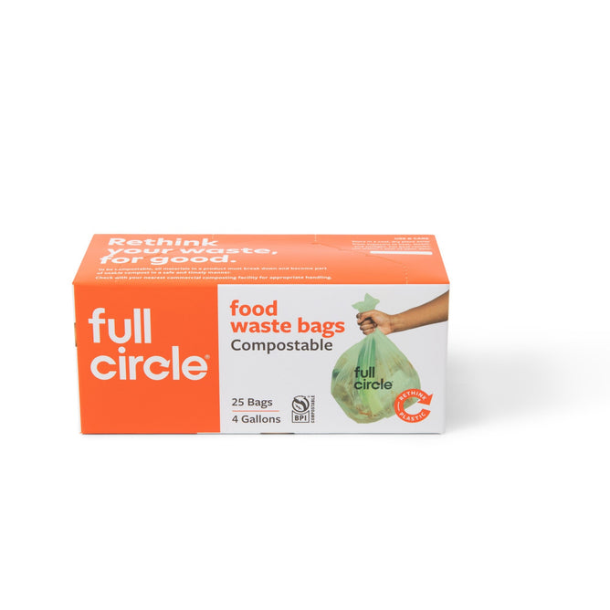 Full Circles compostable waste bags come in a 25-bag box featuring an orange and white design. The packaging, adorned with a hand holding a green bag, offers 4-gallon capacity per bag.
