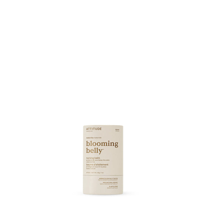 An upright cylindrical container of ATTITUDE blooming belly Nursing Balm for breastfeeding and sensitive skin is shown on a plain white background. The off-white packaging features brown text.