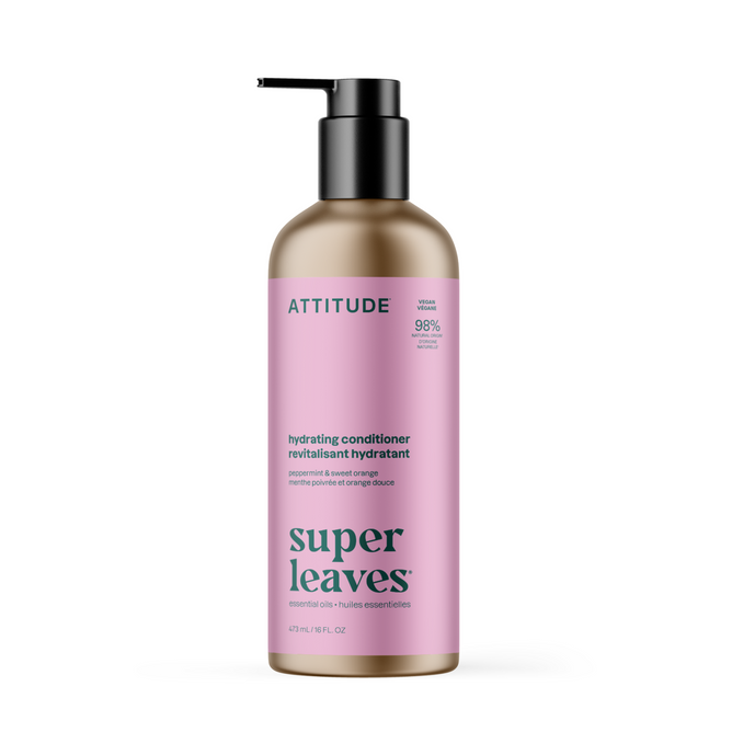 A bottle of ATTITUDE super leaves essential oils Conditioner Hydrating features a black pump, gold base, pink label, and highlights Peppermint & Sweet Orange scent with 98% naturally sourced ingredients.