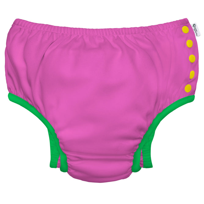 The Green Sprouts Eco Snap Swim Diaper features pink recycled polyester with green trim and functional yellow side snaps, designed for 12-month-olds (18-22 lbs).