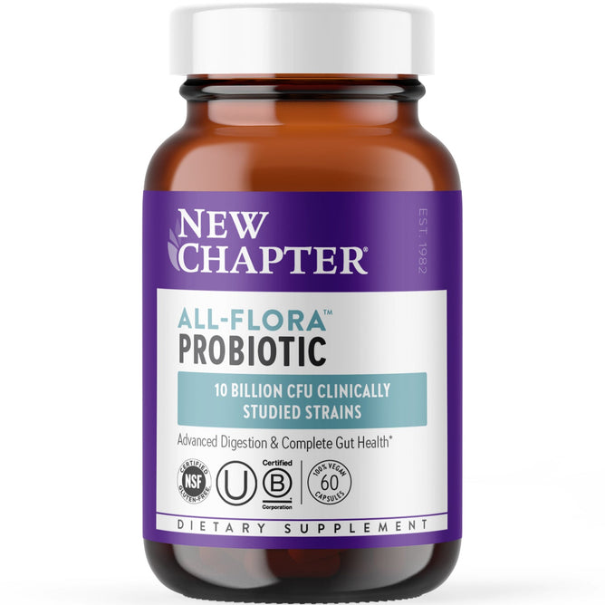 A brown glass bottle labeled New Chapter Probiotic All-Flora contains dietary supplements for gut health, featuring 10 billion CFU clinically studied strains. The label is purple and white and displays various certifications.