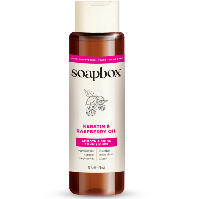 Soapboxs Vegan Keratin & Raspberry Seed Oil Smoothing Conditioner includes vegan keratin and shine-enhancing argan oil. This 16 fl oz (473 ml) conditioner is sulfate-free, vegan, color-safe, and ideal for boosting your hairs natural luster.